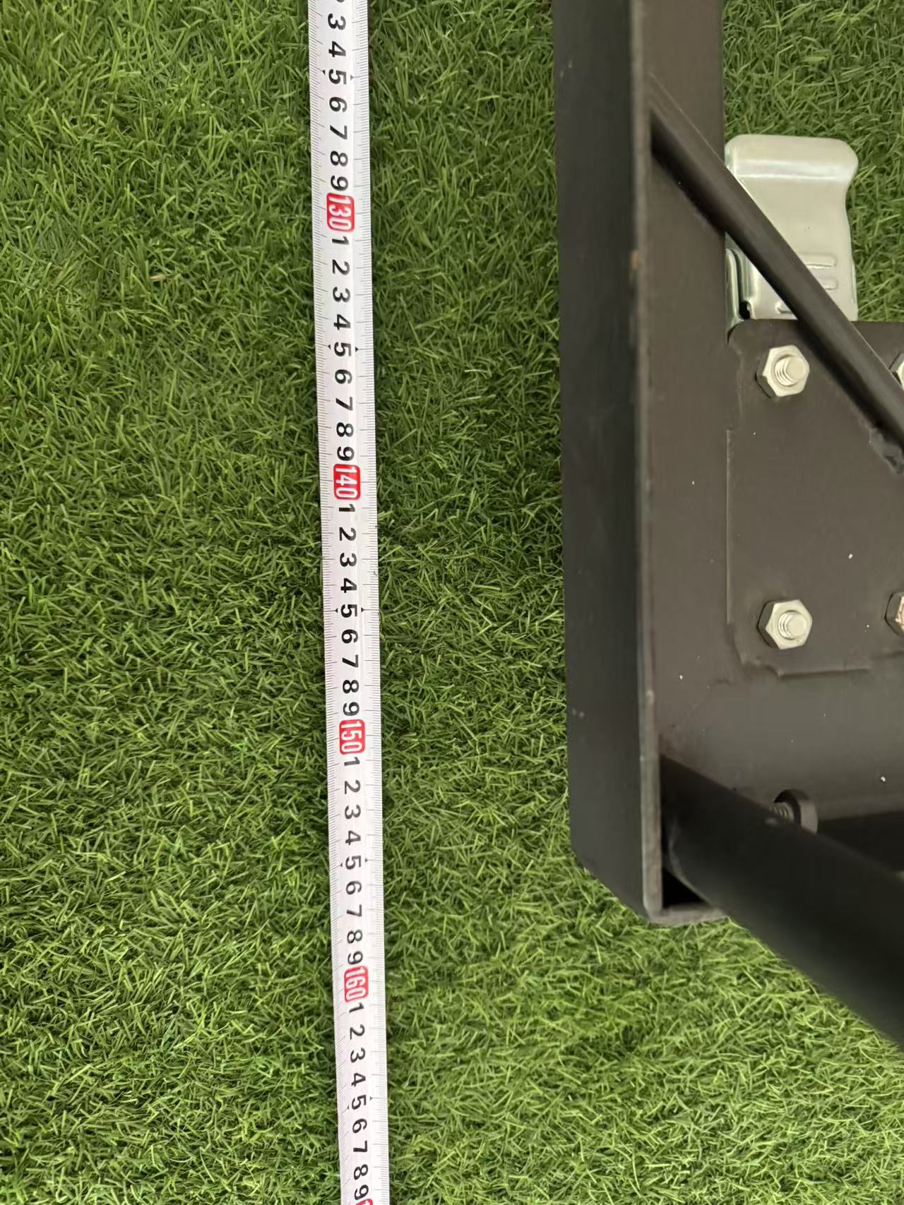 Table trolley metal frame with measuring tape showing product dimensions