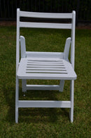 white slatted folding chair
