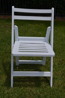 white slatted folding chair